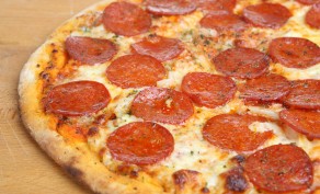 Large Cheese or Pepperoni Pizza + 4 Medium Drinks ($25.99 Value)